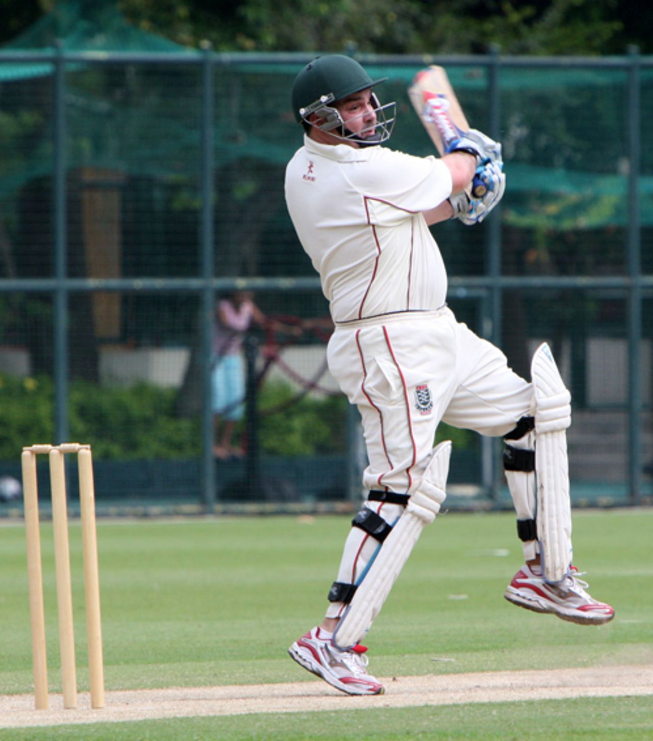 Anthony Barnet plays a cut shot for Infidels against Templars