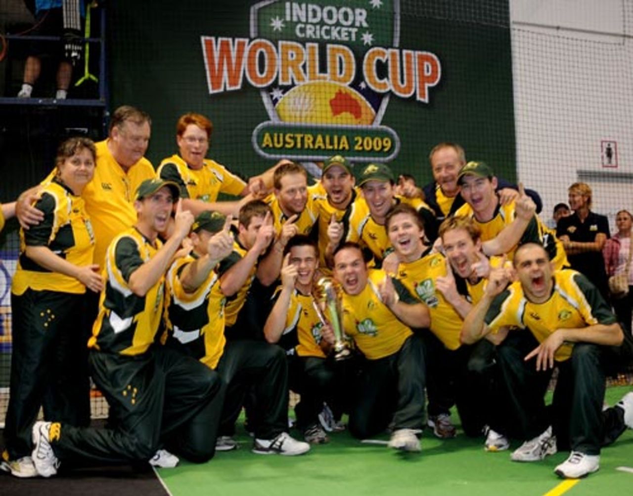 The Australian indoor cricket team celebrate after winning the Indoor Cricket World Cup, Brisbane, October 17, 2009