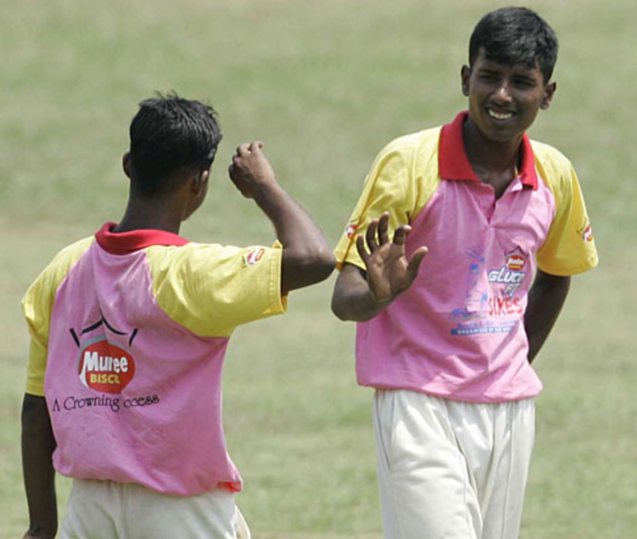 Rajeswar Nirujan gets the high fives after picking up a wicket, Jaffna Combine Schools v Richmond College, Glucofit Cricket Sixes, Colombo, October 18, 2009