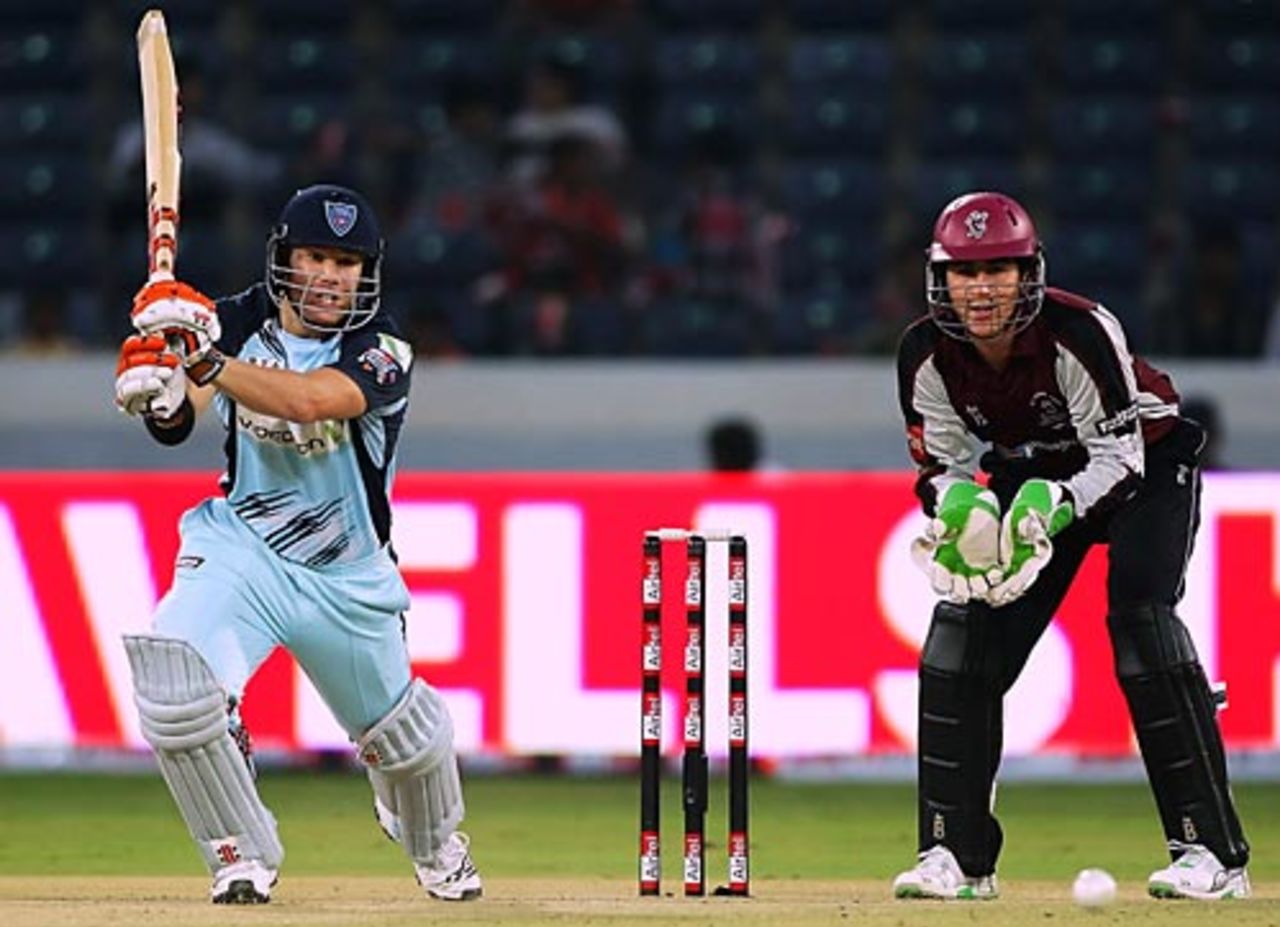David Warner drives through the off side, NSW v Somerset, Champions League, Hyderabad, October 18, 2009