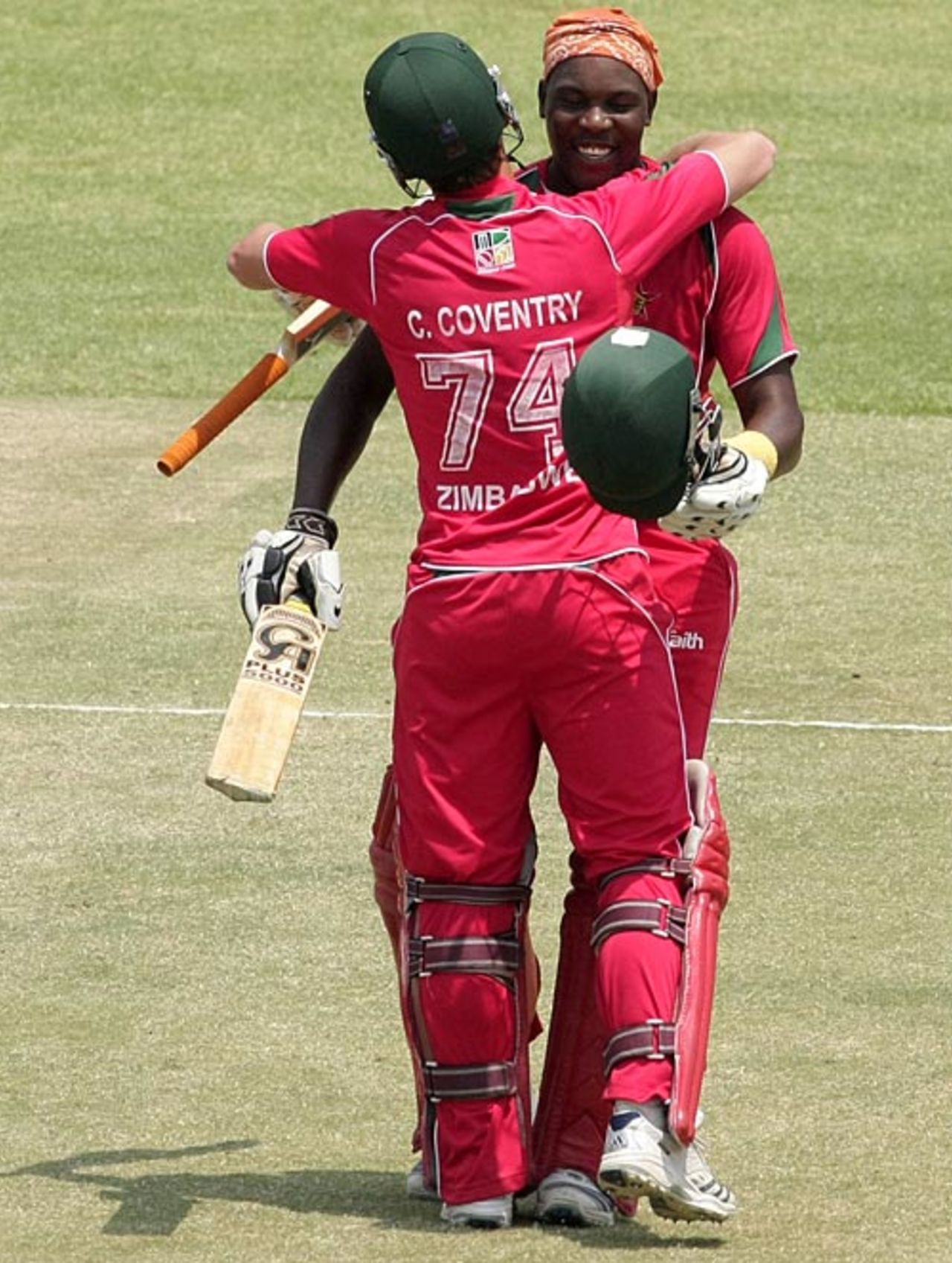 Charles Coventry congratulates Hamilton Masakadza, Zimbabwe v Kenya, 5th ODI, Harare, October 18, 2009