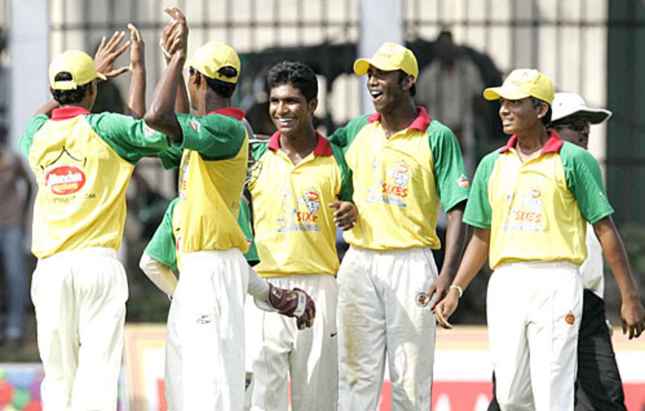 Kasun Fernando is congratulated after taking a hat-trick, Ananda College v St Sebastians College, Glucofit Cricket Sixes, Colombo, October 18, 2009 