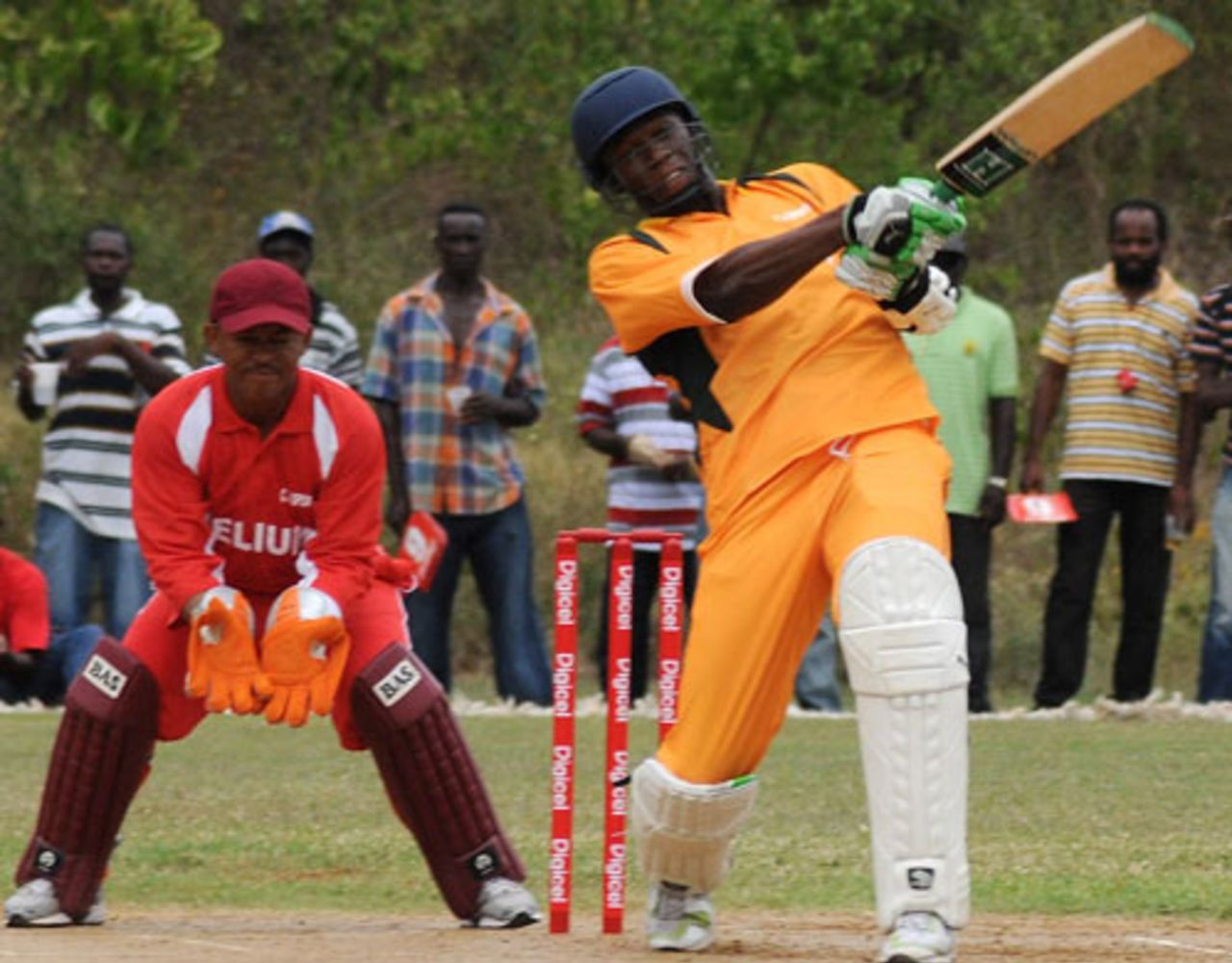 Usain  Bolt swipes the ball to the leg side at a friendly cricket match in Jamaica, October 18, 2009