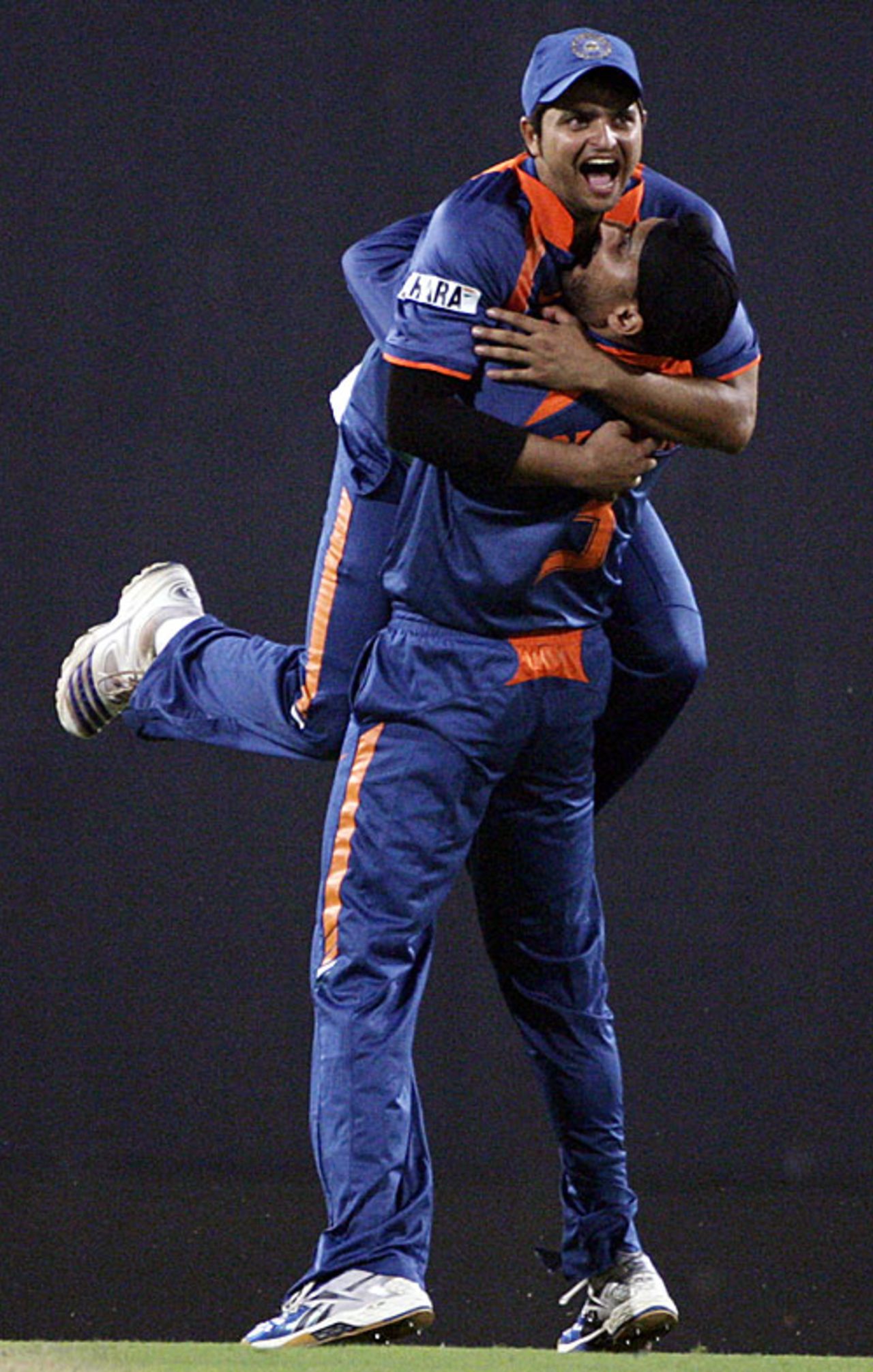 Harbhajan Singh gets a hug from Suresh Raina after getting rid off Cameron White, India v Australia, 2nd ODI, Nagpur, October 28, 2009