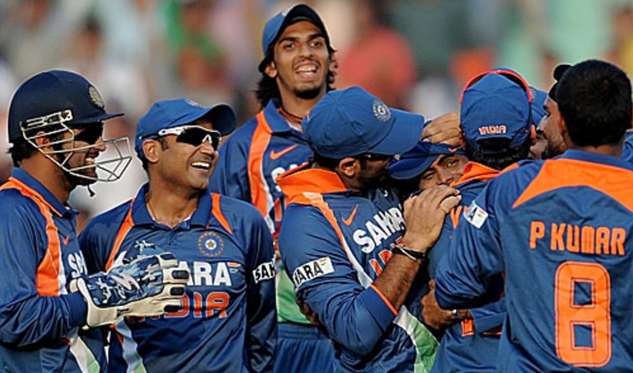 The Indians crowd Ravindra Jadeja following the run out of Ricky Ponting, India v Australia, 4th ODI, Mohali, November 2, 2009