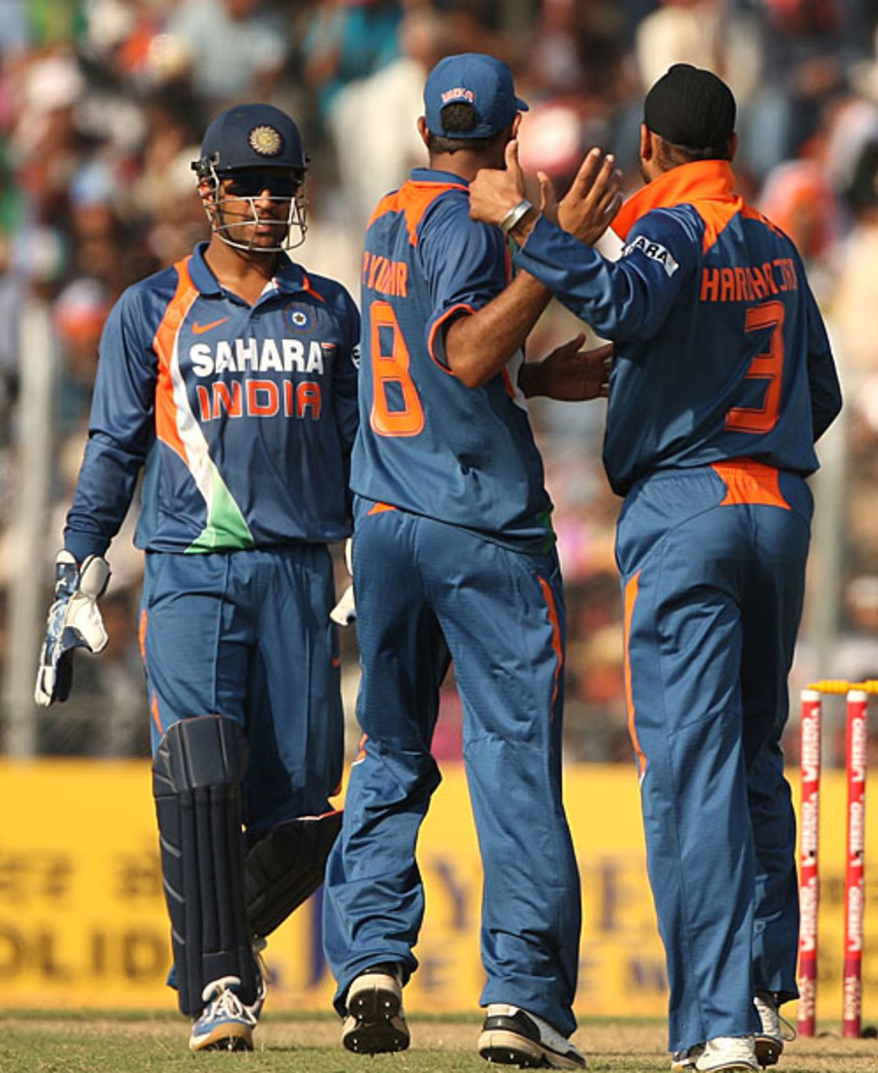 Harbhajan Singh gets the congratulations after dismissing Ricky Ponting, India v Australia, 6th ODI, Guwahati, November 8, 2009