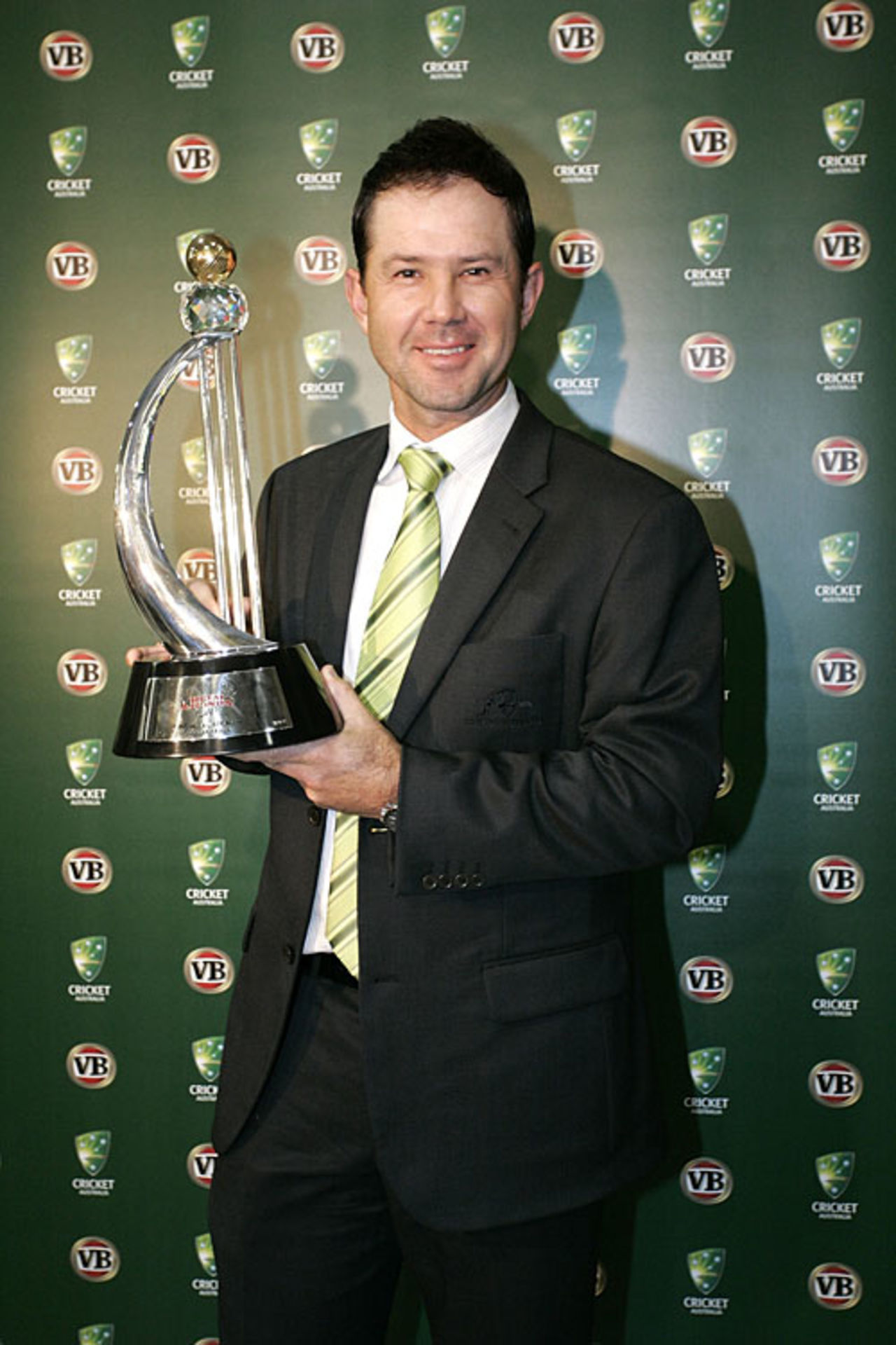 Ricky Ponting poses with the trophy on his return to Australia, Melbourne, November 12, 2009