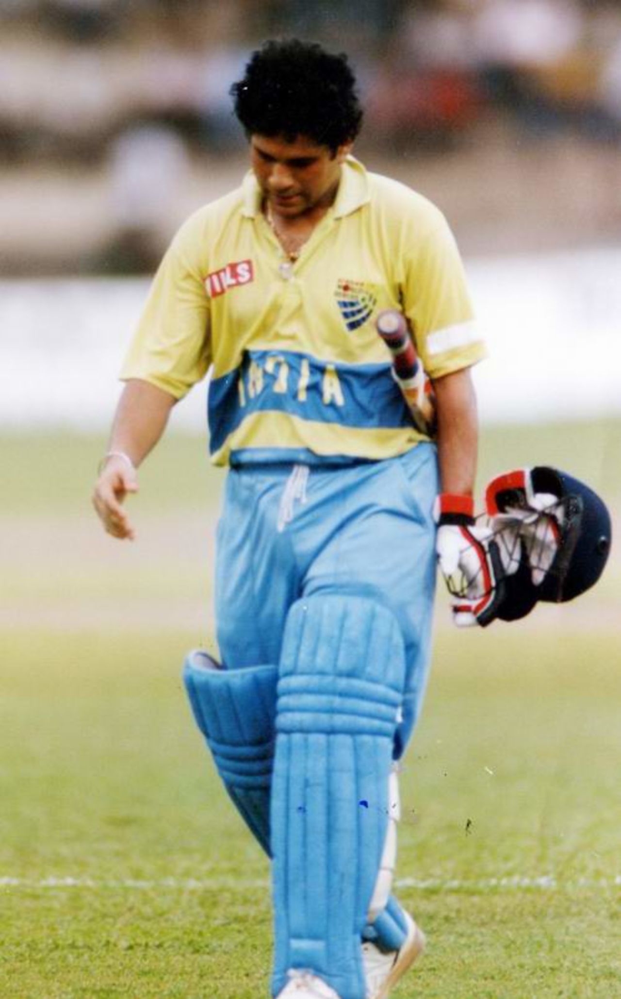 Sachin Tendulkar walks off