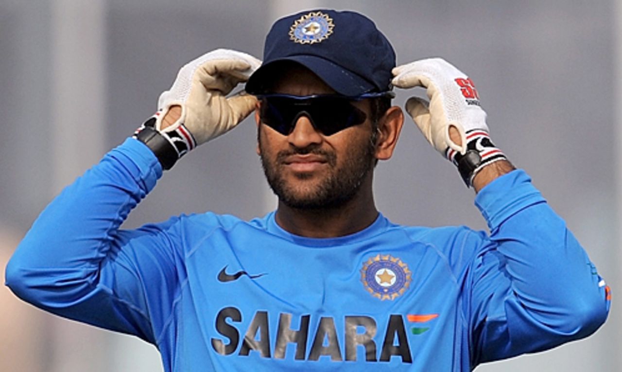 MS Dhoni stands watch during training, Kanpur, November 23, 2009