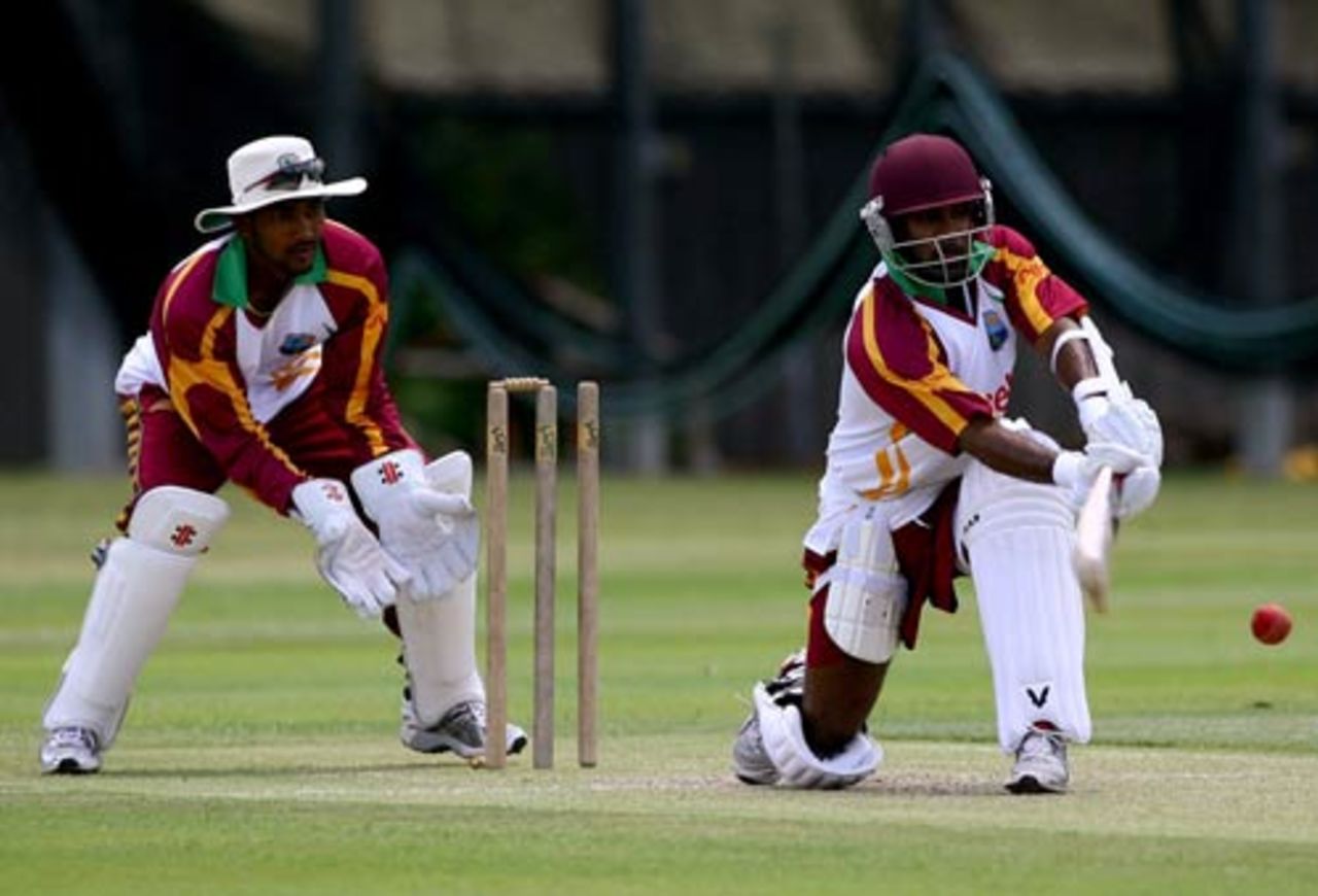 Adrian Barath sweeps during a West Indies practice session, Brisbane, November 24, 2009