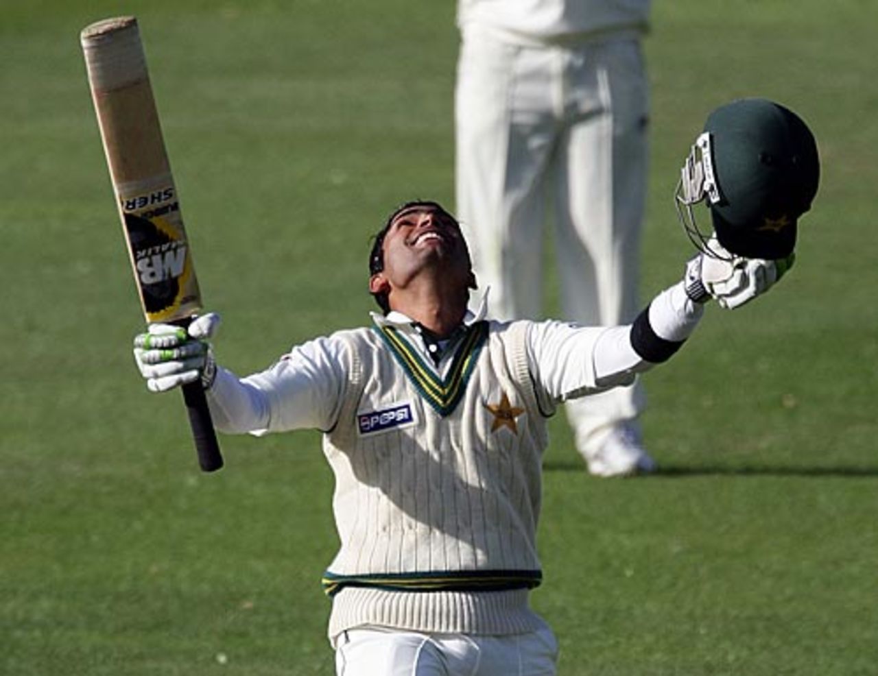 Umar Akmal celebrates his century on debut, New Zealand v Pakistan, 1st Test, Dunedin, 3rd day, November 26, 2009