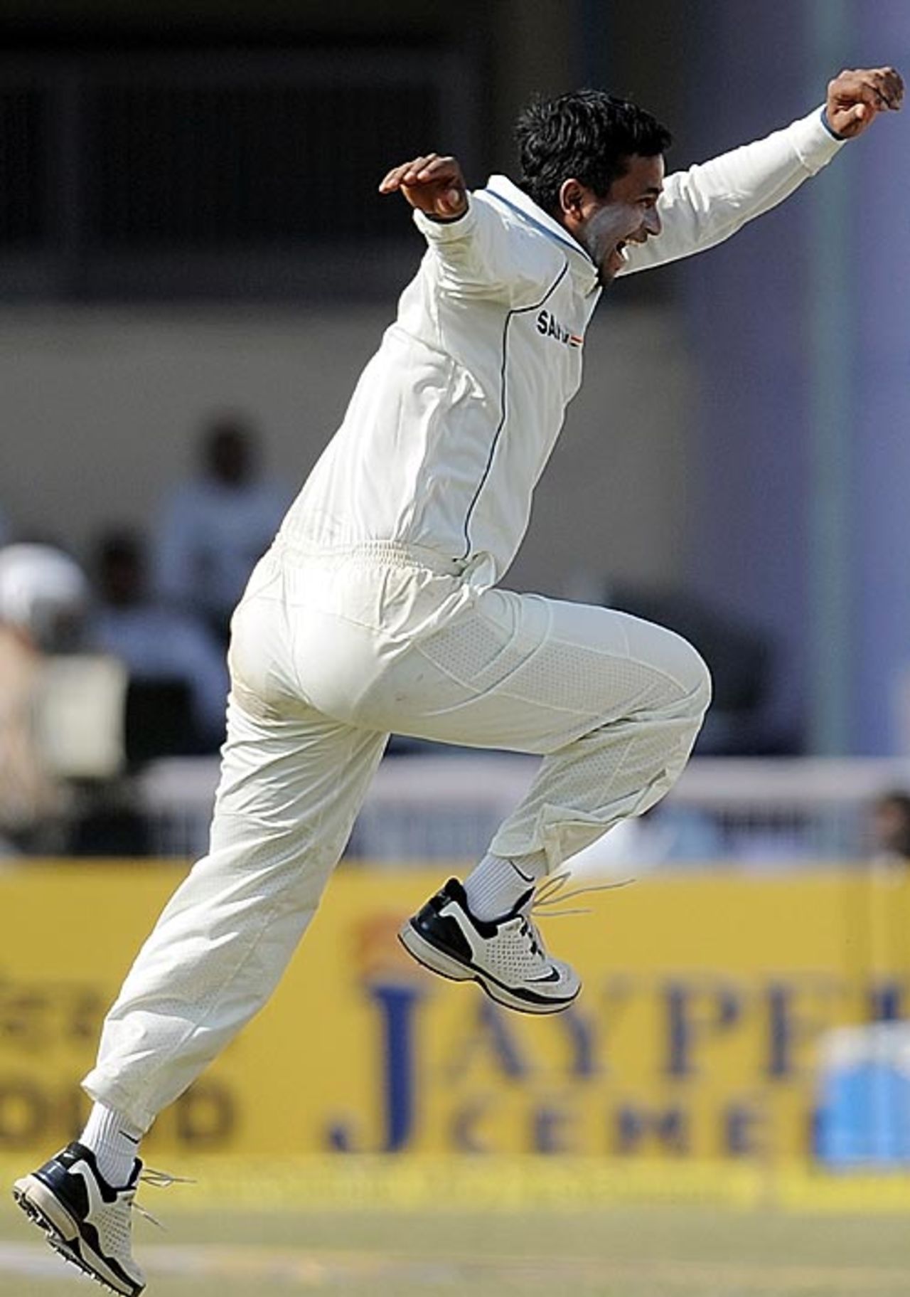 Pragyan Ojha celebrates his maiden Test wicket, India v Sri Lanka, 2nd Test, Kanpur, 3rd day, November 26, 2009