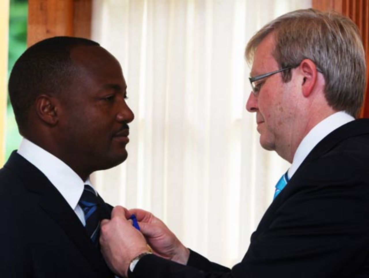Brian Lara is presented with the insignia of the Order of Australia by Australian prime minister Kevin Rudd, Port of Spain, Trinidad & Tobago, November 29. 2009 