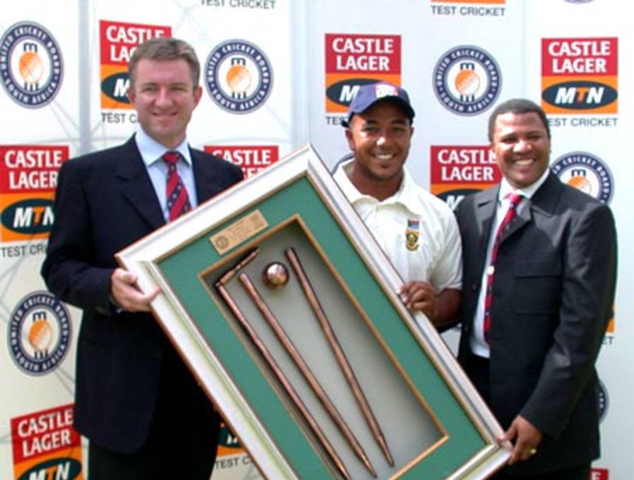 Paul Adams receives an award from the United Cricket Board on reaching 100 test wickets