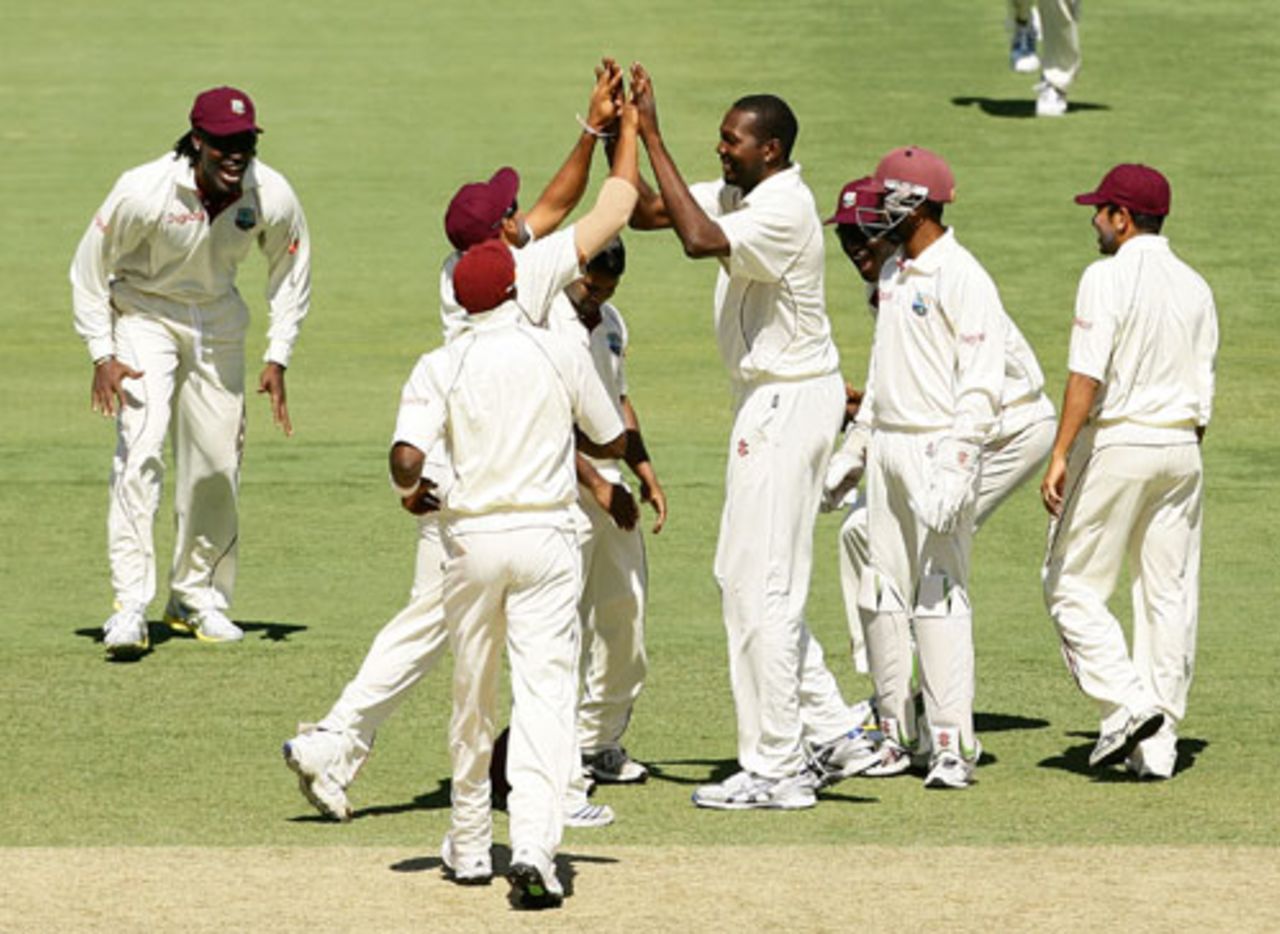 West Indies surround Sulieman Benn after he removed Shane Watson, Australia v West Indies, 2nd Test, Adelaide