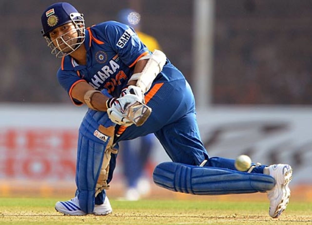 Sachin Tendulkar sweeps during his half-century, India v Sri Lanka, 1st ODI, Rajkot, December 15, 2009