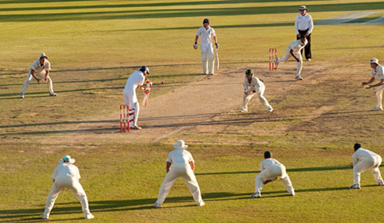 Graham Onions resolutely blocks as the South African close fielders swarm, waiting for a chance, South Africa v England, 1st Test, Centurion, 5th day, December 20, 2009