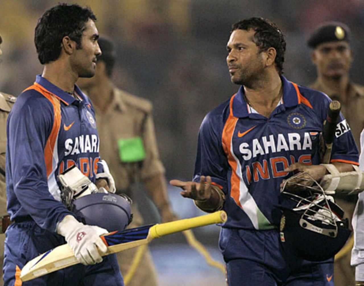 Sachin Tendulkar makes a point to Dinesh Karthik after wrapping up the match, India v Sri Lanka, 3rd ODI, Cuttack, December 21, 2009