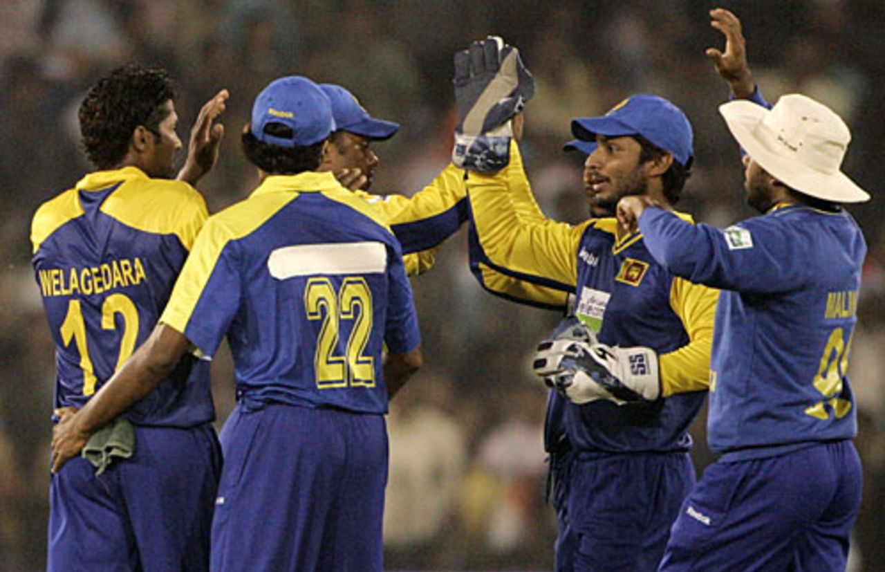 Chanaka Welegedara gets the high-fives after removing Virender Sehwag, India v Sri Lanka, 3rd ODI, Cuttack, December 21, 2009