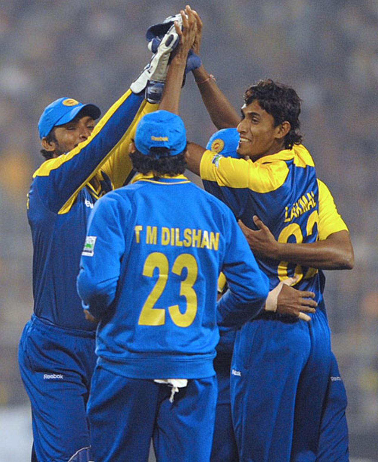 Team-mates crowd around Suranga Lakmal after Sachin Tendulkar's dismissal, India v Sri Lanka, 4th ODI, Kolkata, December 24, 2009