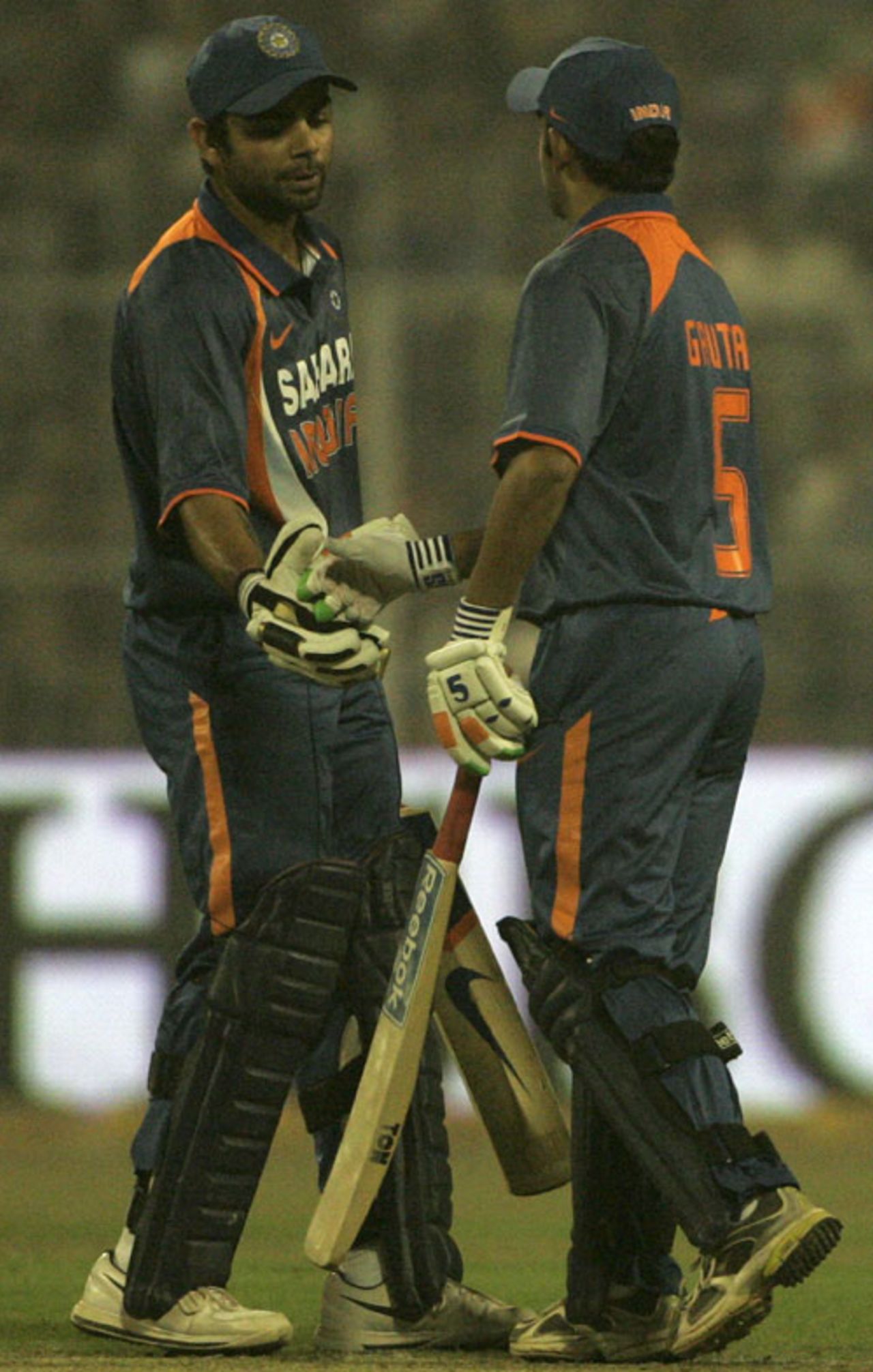 Virat Kohli congratulates Gautam Gambhir on his half-century, India v Sri Lanka, 4th ODI, Kolkata, December 24, 2009