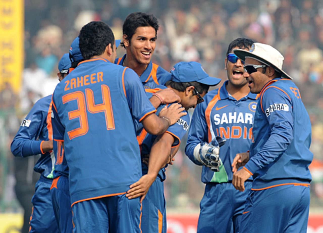 The debutant Sudeep Tyagi takes the plaudits for his maiden wicket, India v Sri Lanka, 5th ODI, December 27, 2009