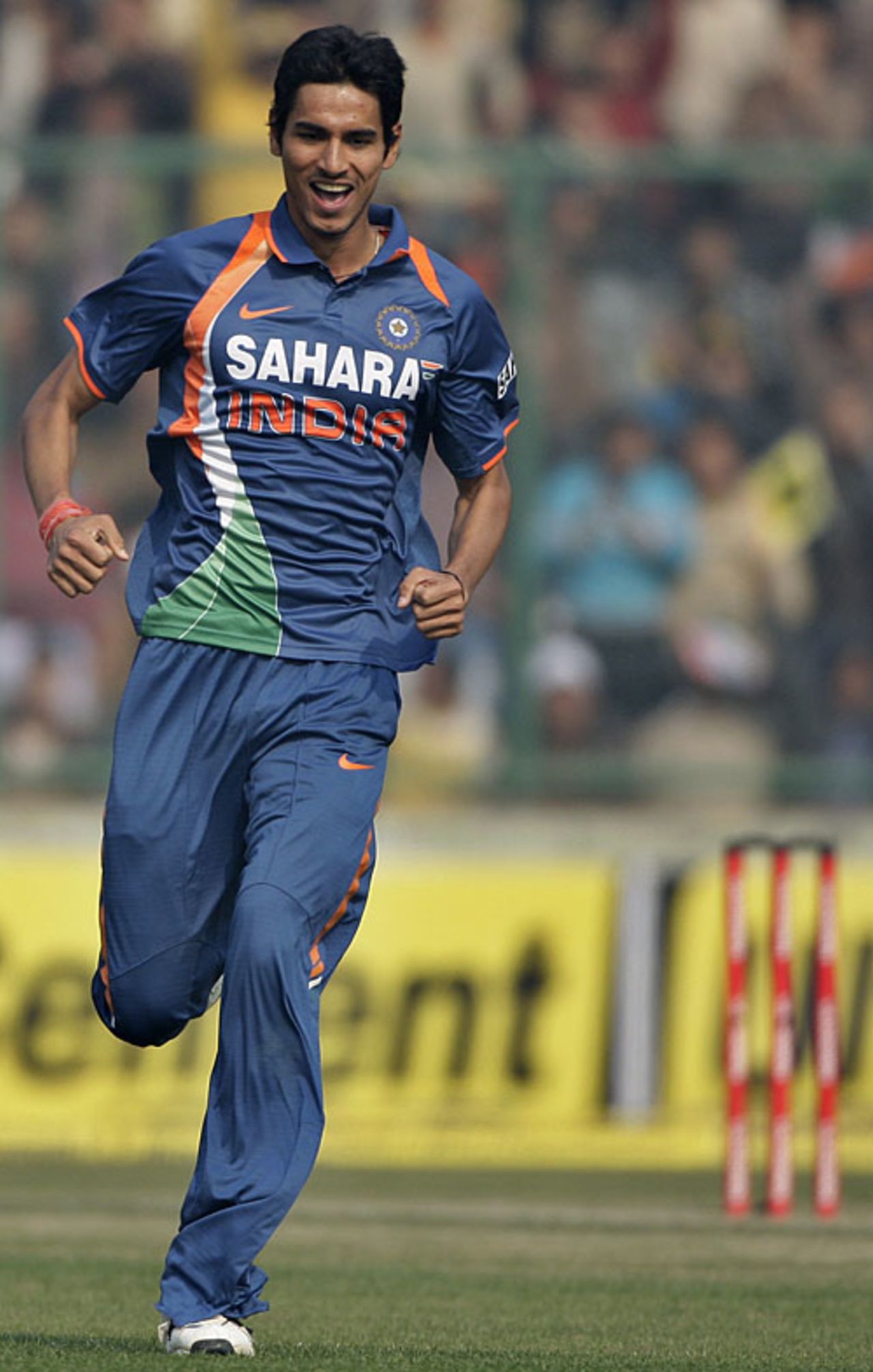 Sudeep Tyagi is cock-a-hoop after taking his first international wicket, India v Sri Lanka, 5th ODI, December 27, 2009