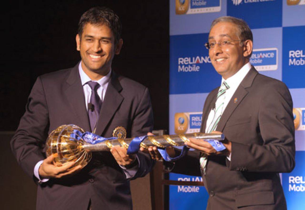 MS Dhoni and Haroon Lorgat pose with the  ICC Test Championship mace, New Delhi, December 27, 2009