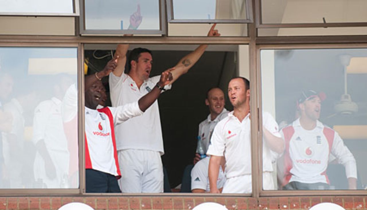 Jonathan Trott celebrates with Kevin Pietersen and Ottis Gibson in the England dressing room, South Africa v England, 2nd Test, Durban, December 30, 2009 