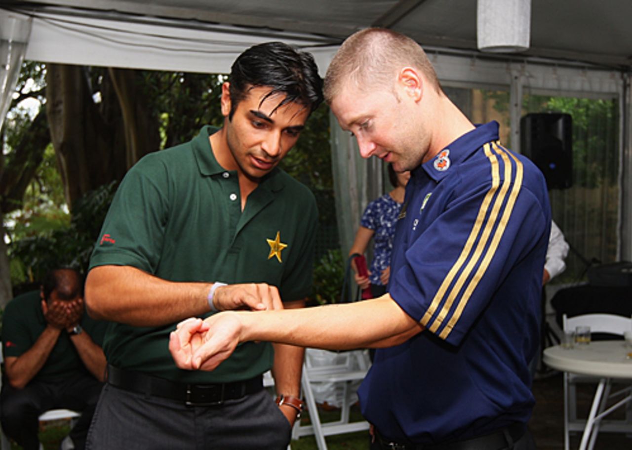 Salman Butt checks out Michael Clarke's tattoo, Sydney, January 2, 2010