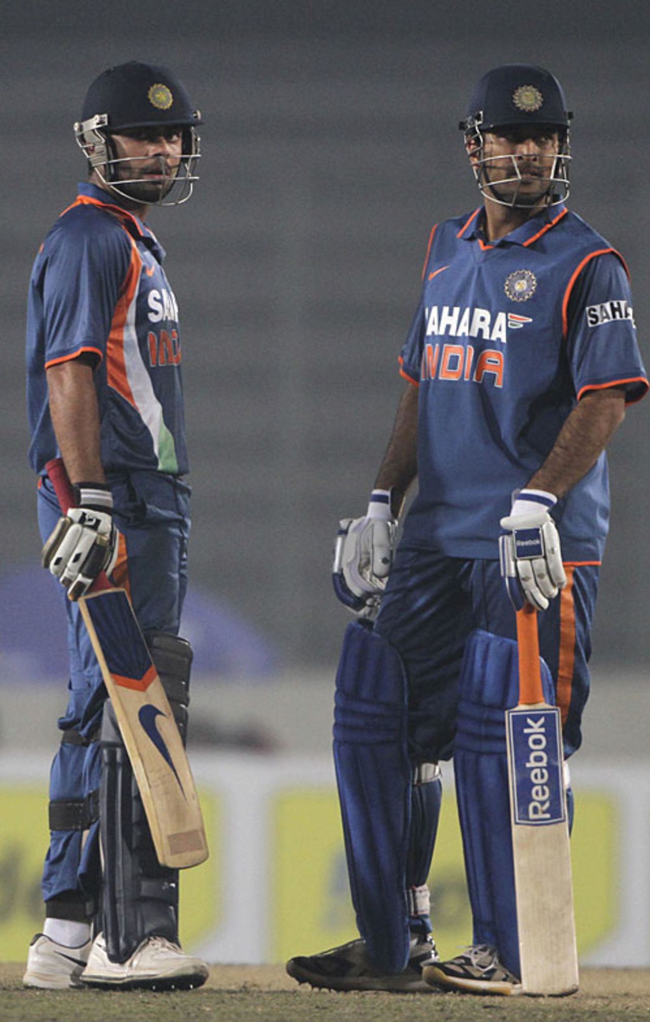Virat Kohli and MS Dhoni take a breather, Bangladesh v India, Tri-series, 3rd ODI, Mirpur, January 7, 2010