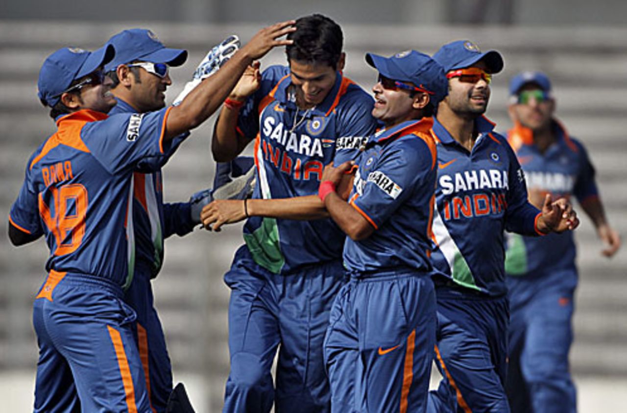 Sudeep Tyagi is congratulated by his team-mates after getting rid of Upul Tharanga, India v Sri Lanka, Tri-series, 5th ODI, Mirpur, January 10, 2010
