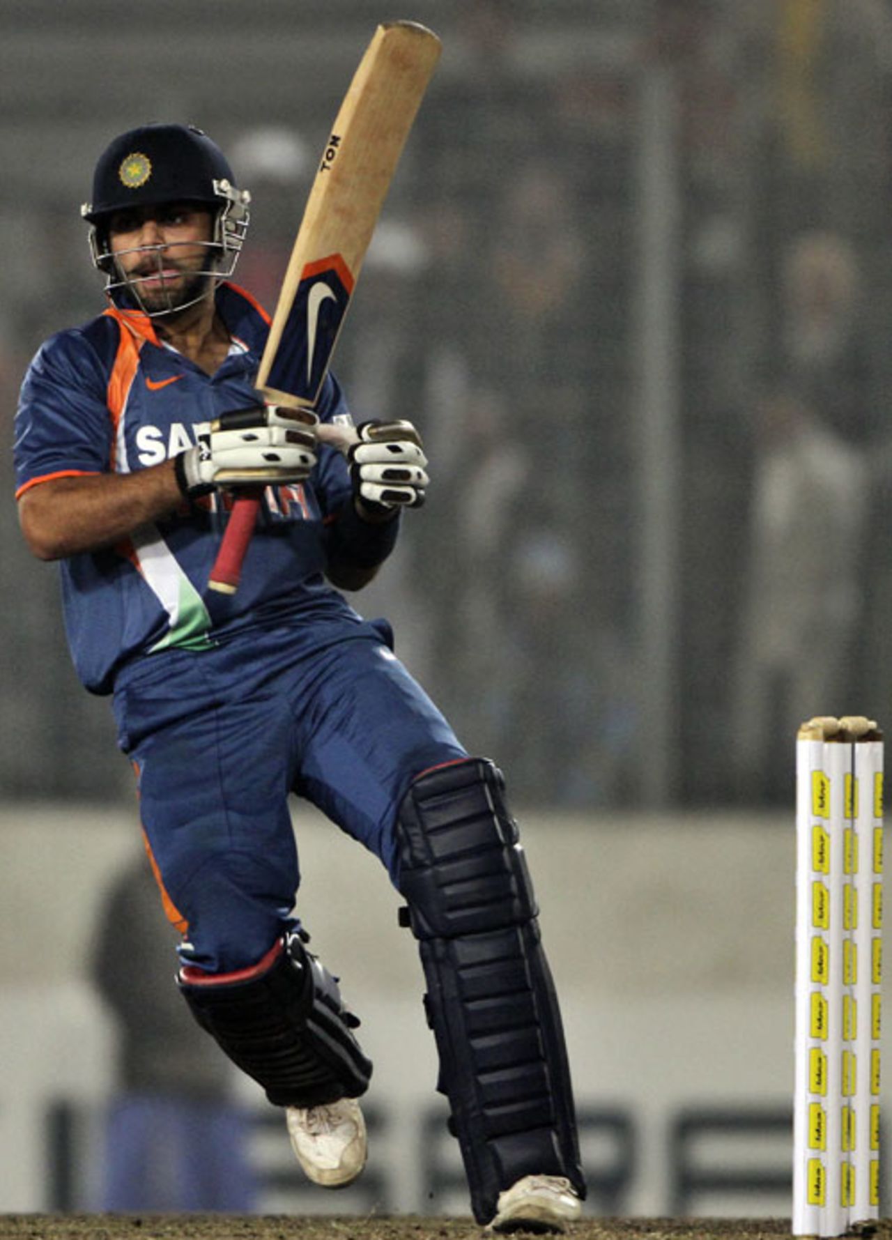 Virat Kohli essays a shot, Bangladesh v India, Tri-series, 6th ODI, Mirpur, January 11, 2010