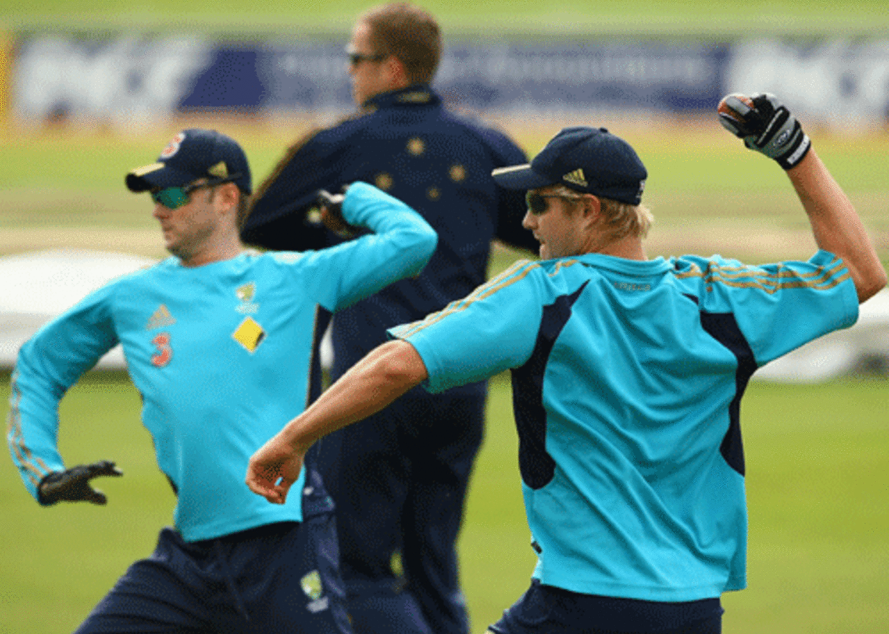 Shane Watson practises his throwing alongside Michael Clarke, Hobart, January 13, 2010