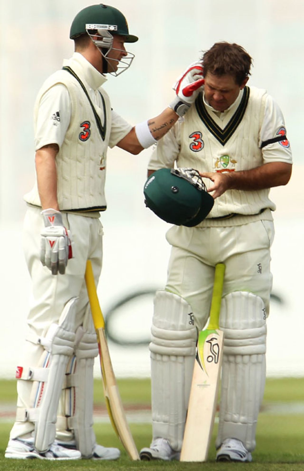 Michael Clarke checks out Ricky Ponting's ear after he was hit by a bouncer, 3rd Test, Australia v Pakistan, 1st day, Hobart, January 14, 2010