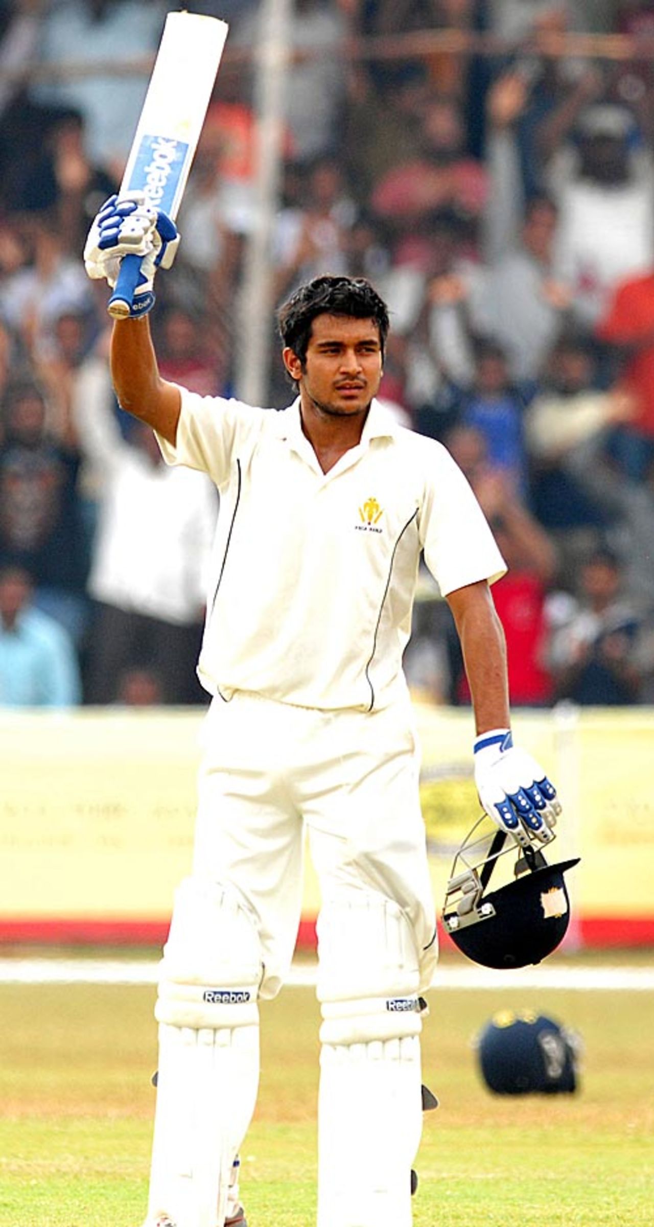Manish Pandey raises his bat after reaching his century, Karnataka v Mumbai, Ranji Trophy final, Mysore, 4th day, January 14, 2010