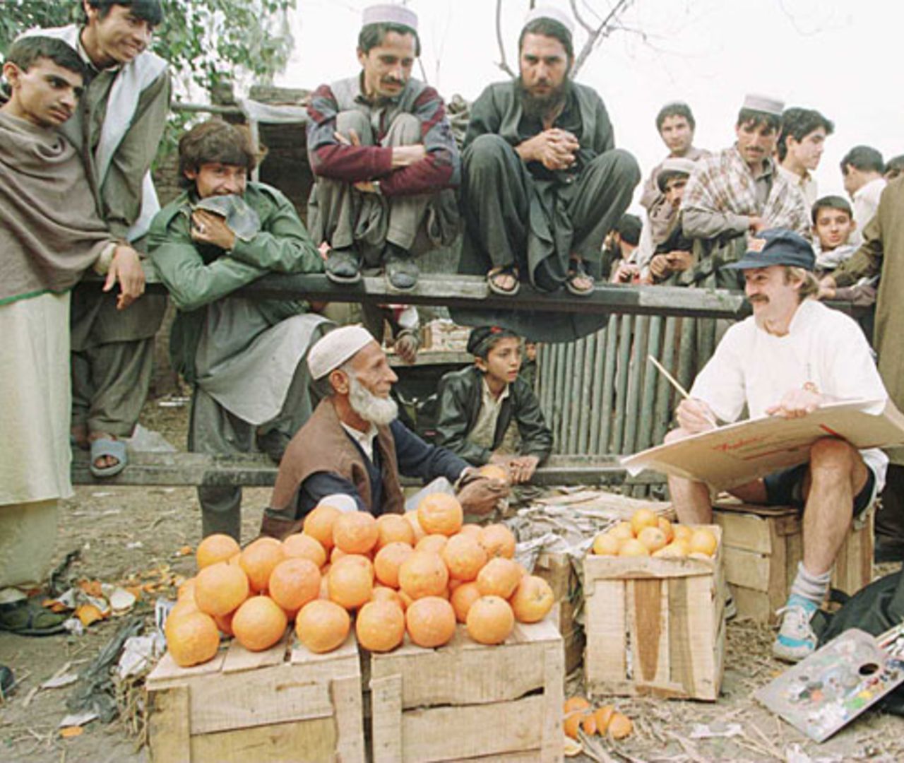 Jack Russell sketches at a bazaar, Peshawar, February 21, 1996
