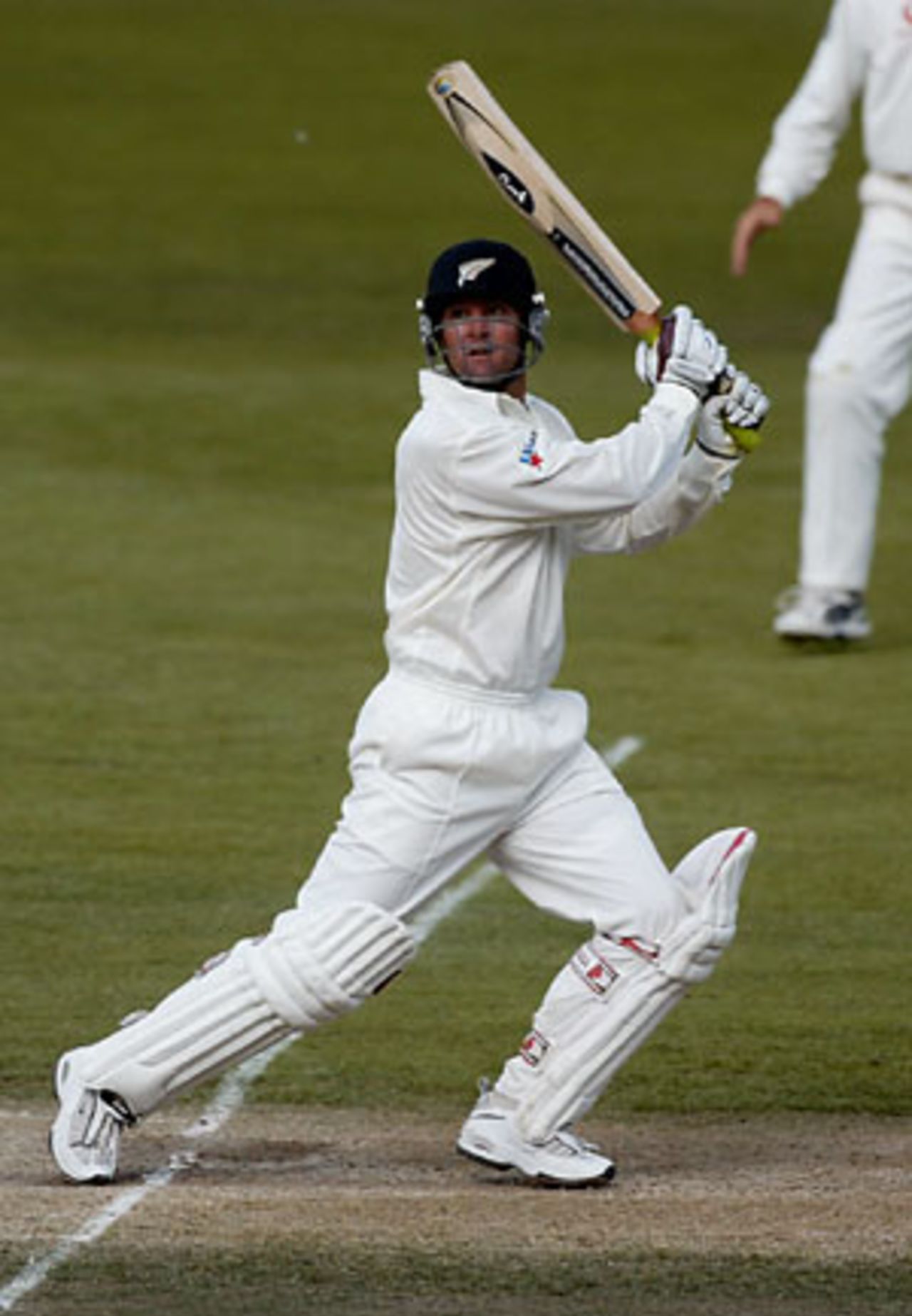New Zealand batsman Nathan Astle cuts a delivery over backward point during his second innings of 222. 1st Test: New Zealand v England at Jade Stadium, Christchurch, 13-17 March 2002 (16 March 2002).