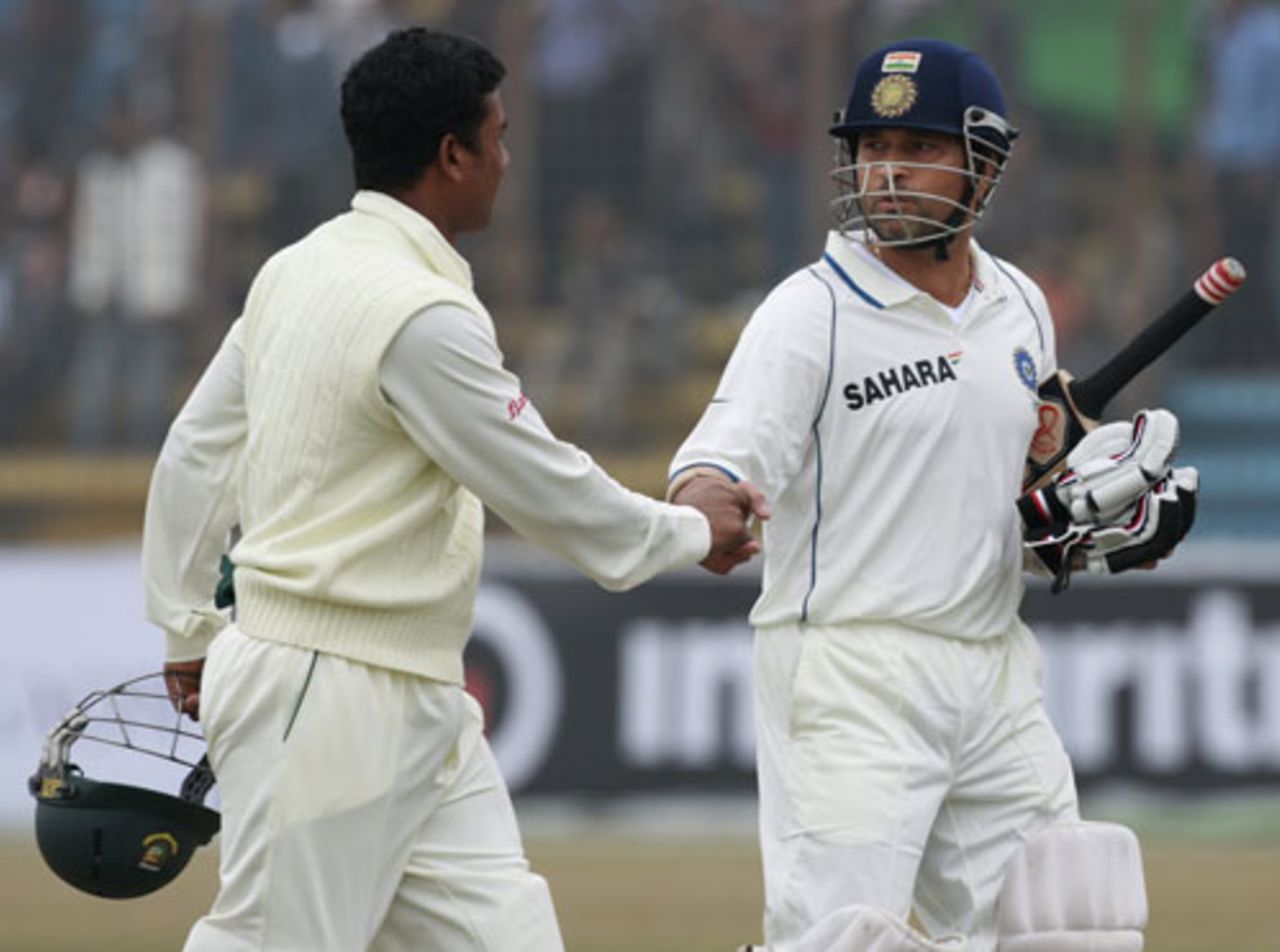 Sachin Tendulkar is congratulated by Raqibul Hasan, Bangladesh v India, 1st Test, Chittagong, 2nd day, January 18, 2010 