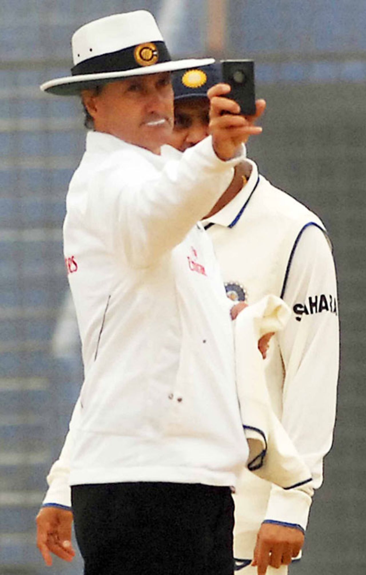 Billy Bowden checks the light meter yet again, Bangladesh v India, 1st Test, Chittagong, 2nd day, January 18, 2010 