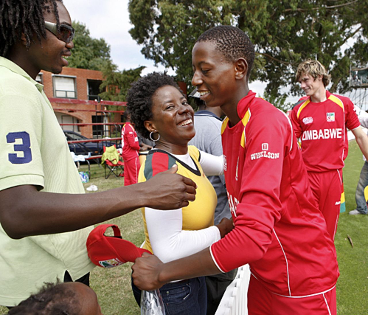 Tinotenda Mutombodzi hugs a Zimbabwean supporter, New Zealand Under-19s v Zimbabwe Under-19s, 19th Match, Group C, ICC Under-19 World Cup, Lincoln, January 19, 2010
