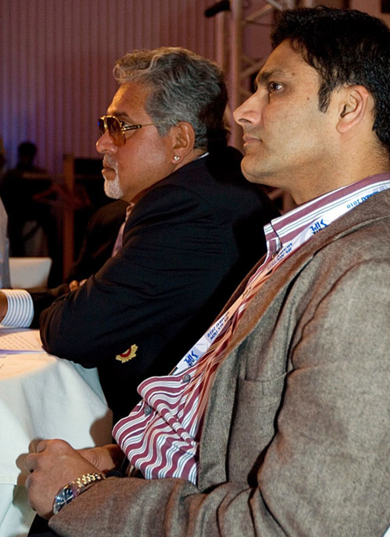 Vijay Mallya and Anil Kumble wait for Eoin Morgan's name to come up, Mumbai, January 19, 2010