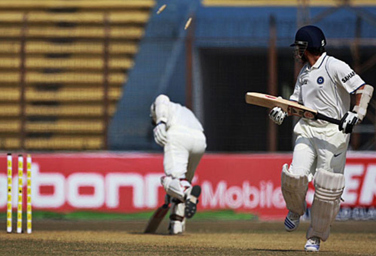 Sachin Tendulkar looks on as Rahul Dravid is run out, Bangladesh v India, 1st Test, Chittagong, 4th day, January 20, 2010 
