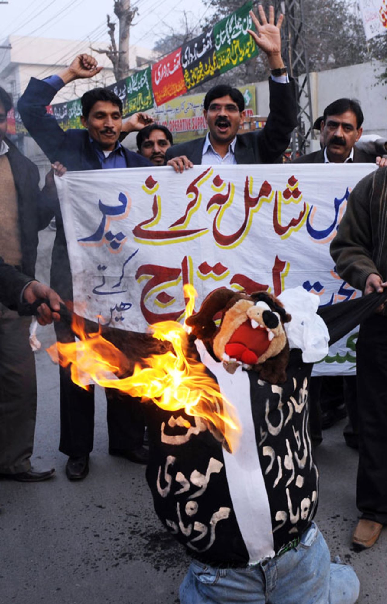 Angry Pakistan cricket fans burn an effigy of Lalit Modi in reaction to the exclusion of Pakistan's cricketers from the third season of the IPL, 20 January, 2010