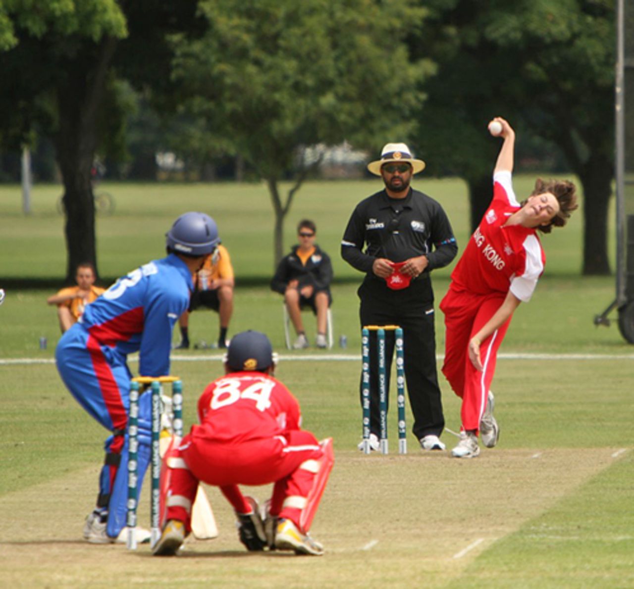 Alex Smith bowling against Afghanistan U19