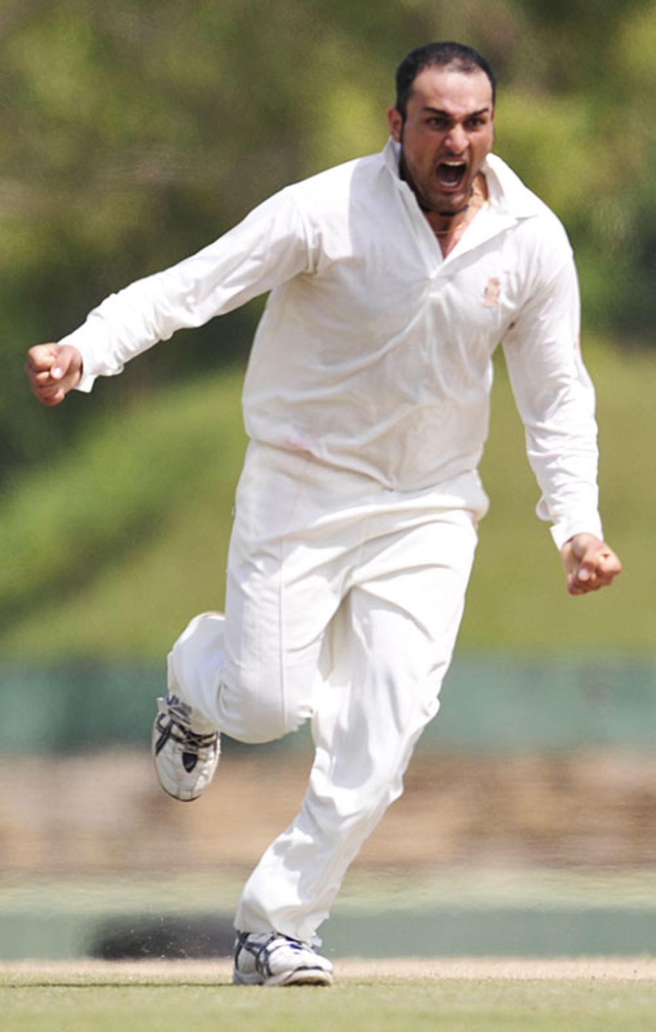 Hamid Hassan is pumped up after dismissing Niall O'Brien, Afghanistan v Ireland, ICC Intercontinental Cup, Dambulla, 4th day, January 24, 2010