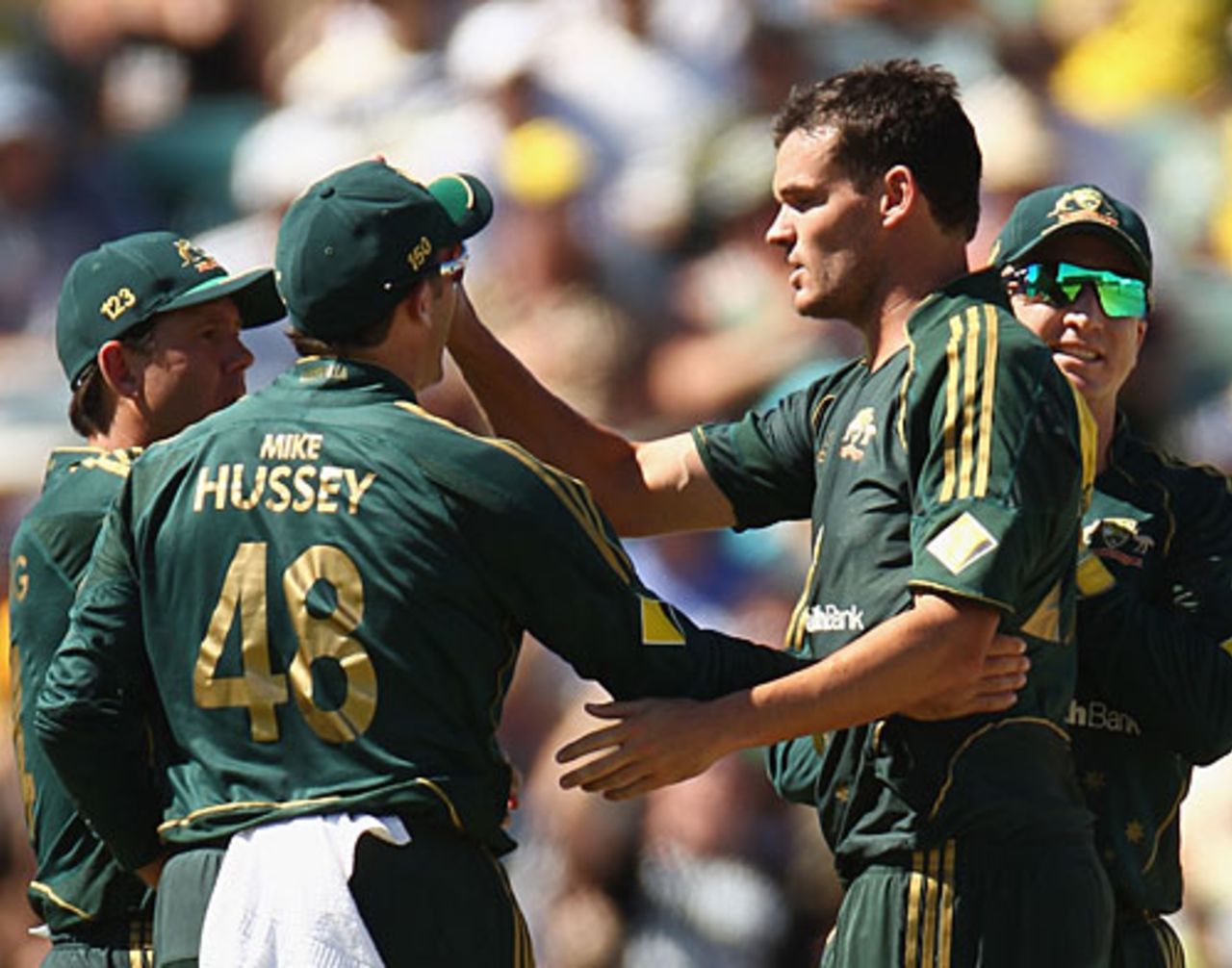 Team-mates congratulate Clint McKay on picking up his fourth wicket, Australia v Pakistan, 5th ODI, Perth, January 31, 2010