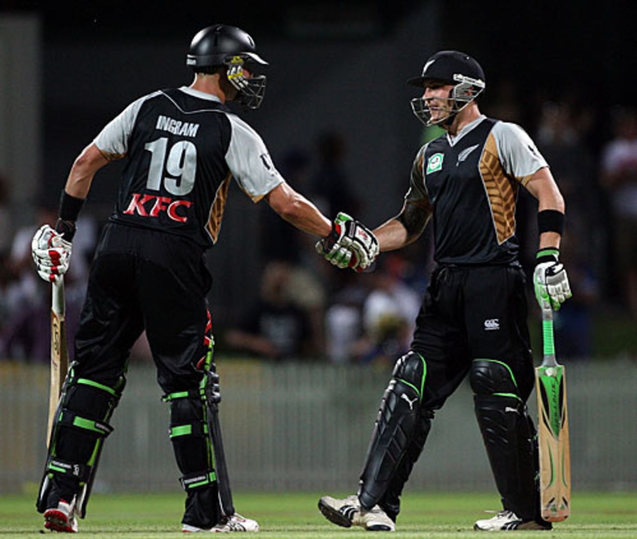 Brendon McCullum is congratulated by Peter Ingram on getting to his fifty, New Zealand v Bangladesh, only Twenty20, Hamilton, February 3, 2010