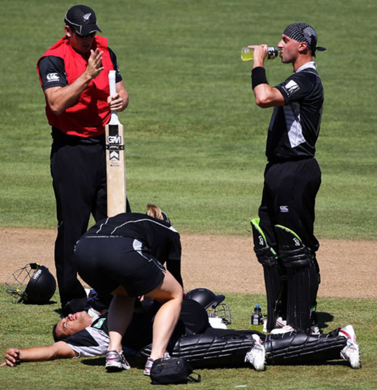 Peter Ingram has a drink while Ross Taylor gets treatment for a sore back, New Zealand v Bangladesh, 1st ODI, Napier, February 5, 2010