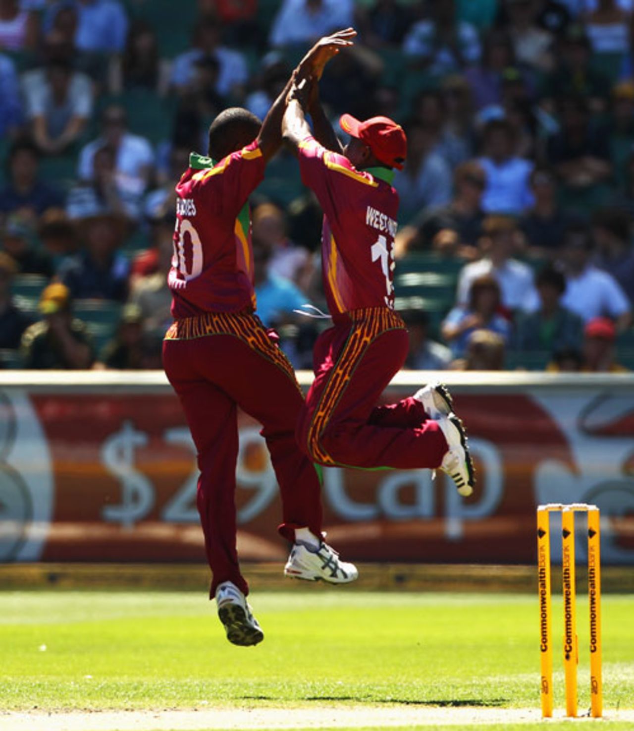 Dwayne Smith jumps high after removing Shaun Marsh, Australia v West Indies, 1st ODI, MCG, 7 February, 2010